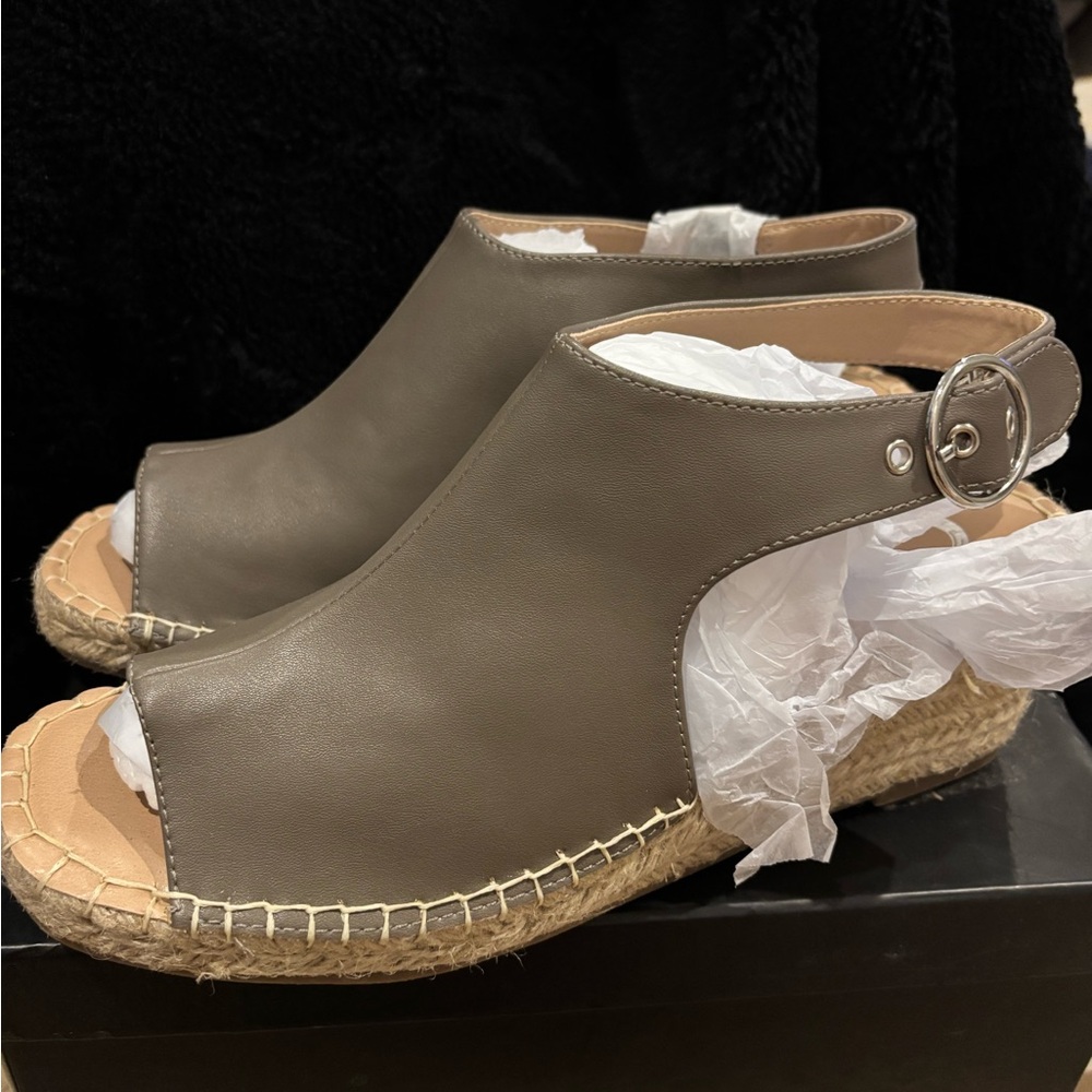 Brand new, never worn grey/taupe sandal. Brand is Journee Collection. Size 9.5